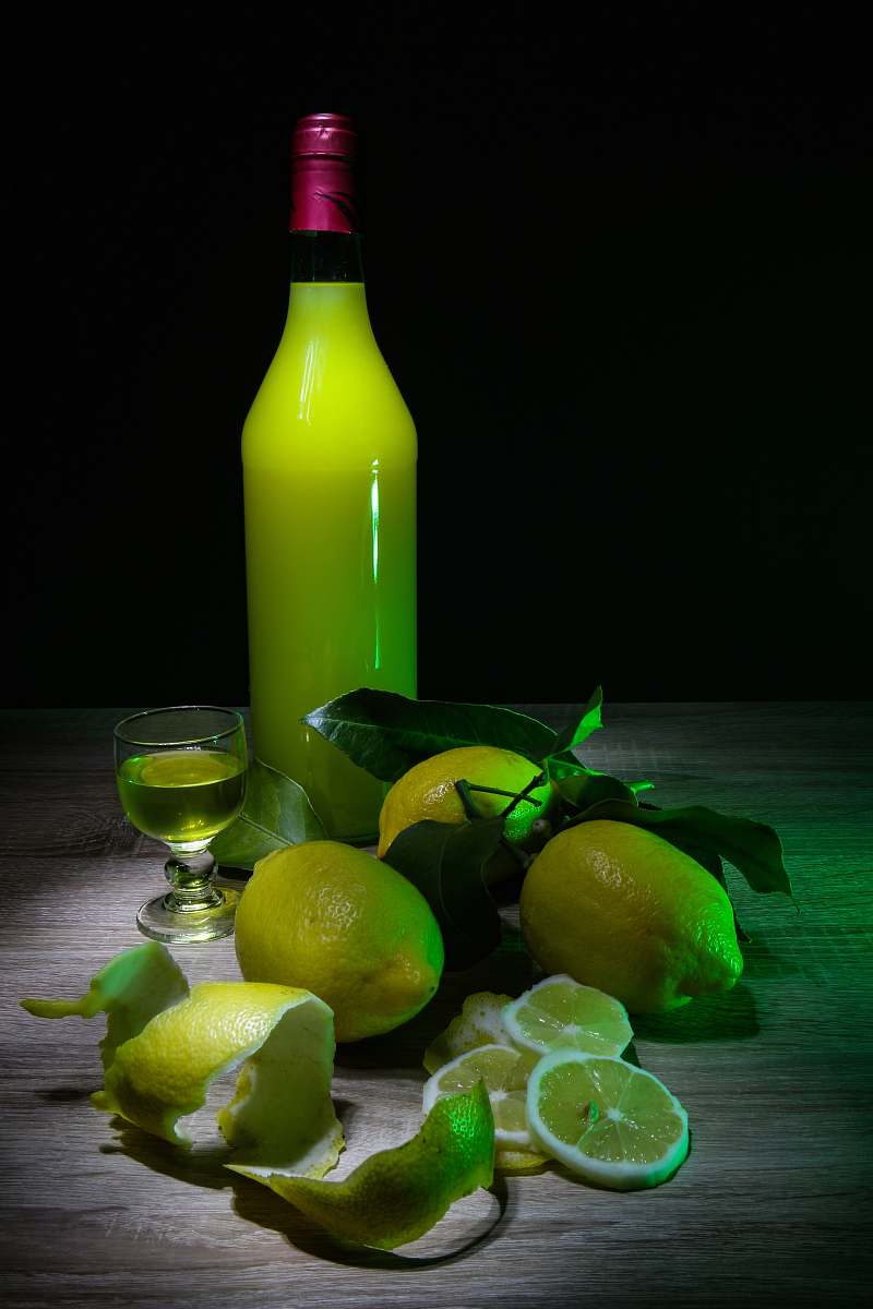 citrus fruit lemon fruits and yellow glass bottle fruit